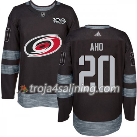 Carolina Hurricanes tröja Sebastian Aho 20 1917-2017 100th Anniversary Adidas Svart Authentic - NHL Tröjor Herr Carolina Hurricanes tröja Sebastian Aho 20 1917-2017 100th Anniversary Adidas Svart Authentic - NHL Tröjor Herr